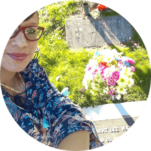 Cheree paying tribute to Harry W. at his grave site in Portland.