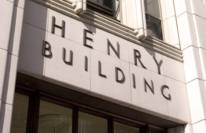 Exterior main entry sign on the Henry Building