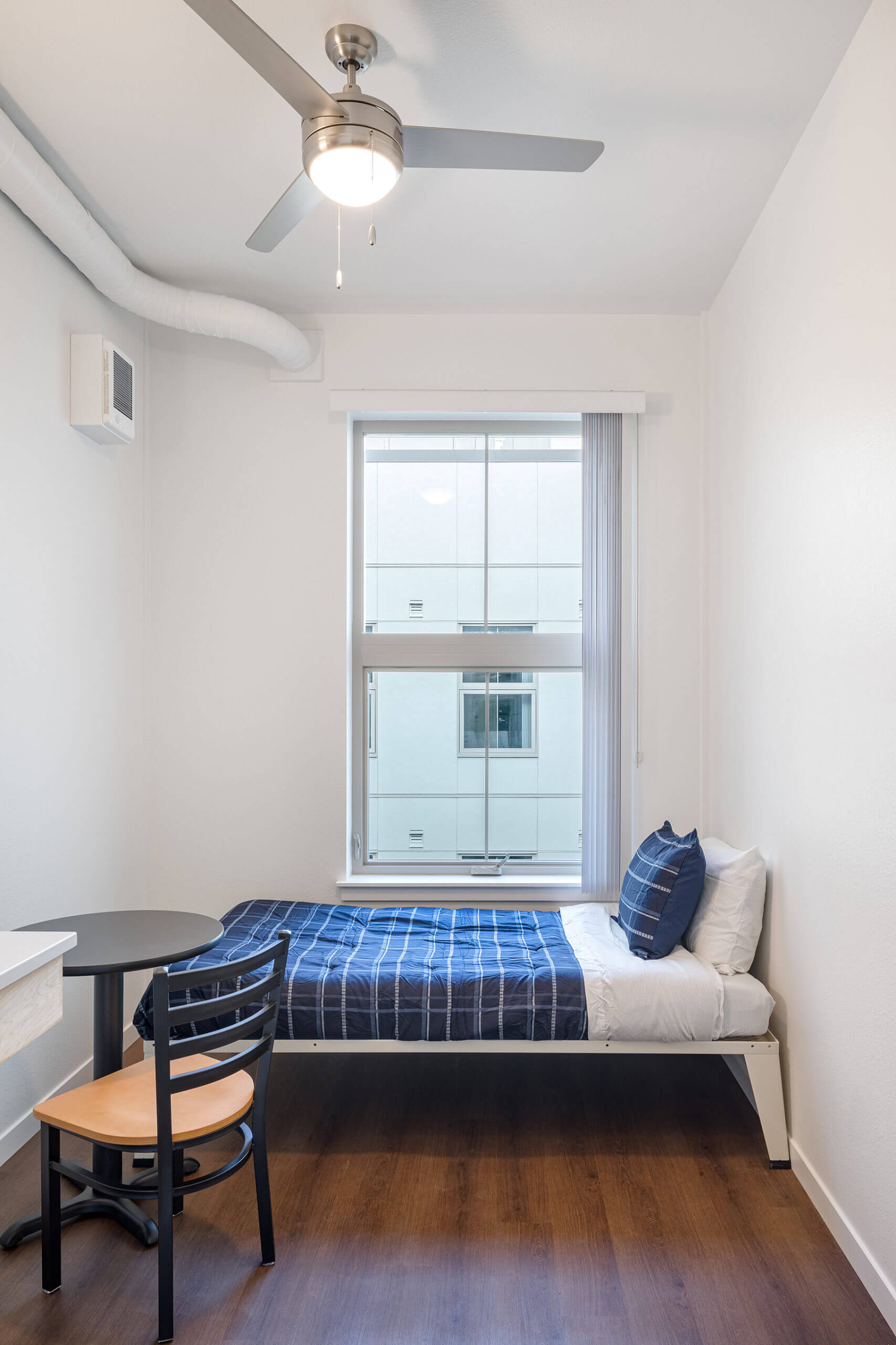 Interior of small studio apartment in the Henry Building