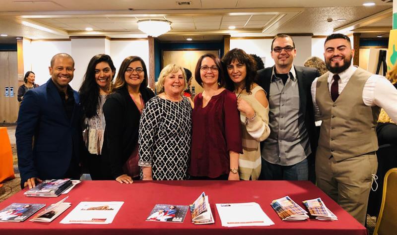Image of Puentes team. From Left: Daniel Garcia, Director of Latino Services; Nuvia Chavez-Tellez, Mental Health Counselor; Marysol Jimenez, Youth Alcohol & Drug Counselor; Cindy Ross, Office Manager; Maide Almeida, Alcohol & Drug Counselor; Ivette Iparraguirre, Alcohol & Drug Counselor; Albert Parramon, Clinical Supervisor; Cesar Ramirez, Mental Health Provider.