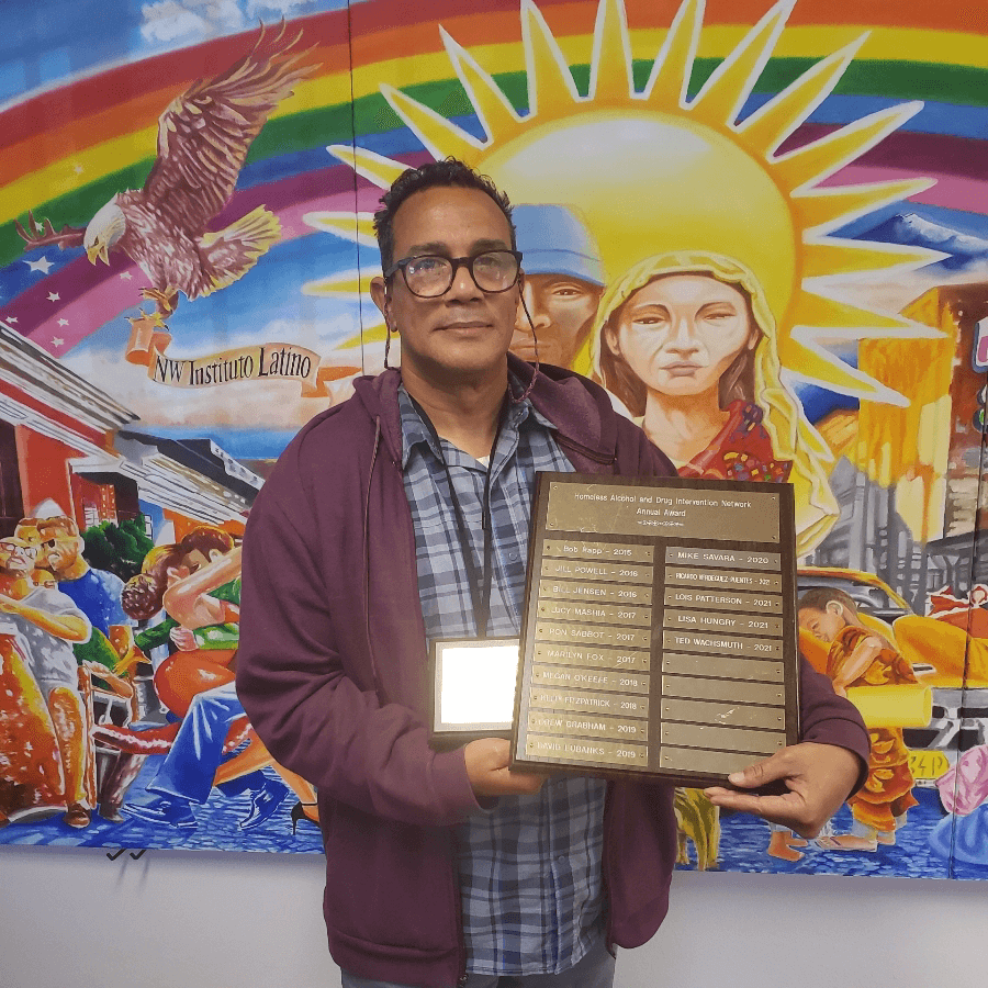 Ricardo Vergeguez holds his HADIN award.