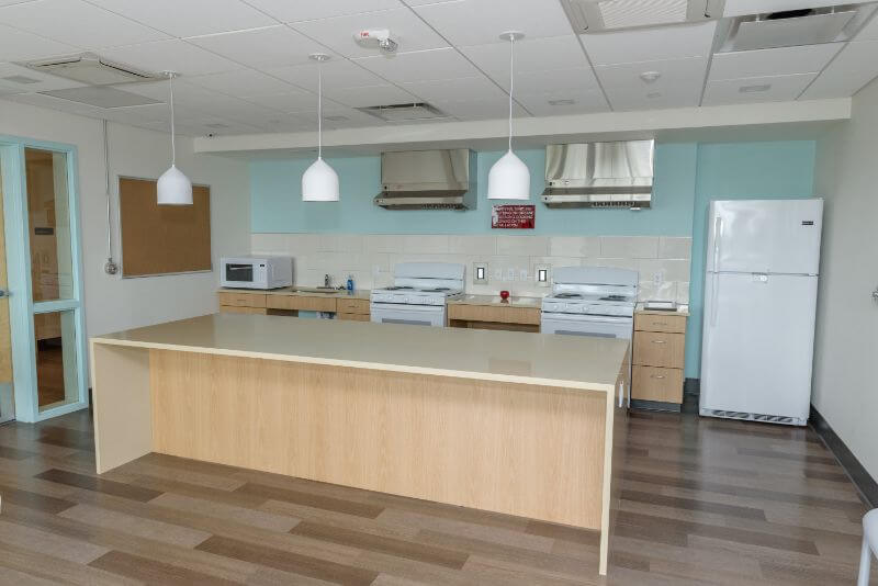 Empty community kitchen at blackburn center grand opening